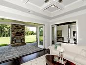 Nana Wall System bi-fold doors open to Stunning Outdoor Living at the Callahan by Waterford Homes at Regency Point